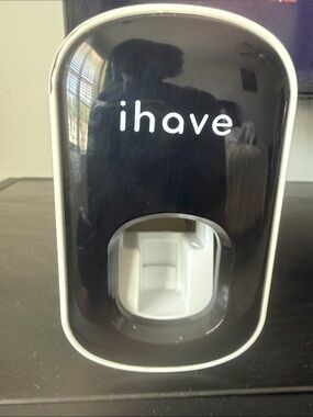ihave Black and white toothpaste dispenser